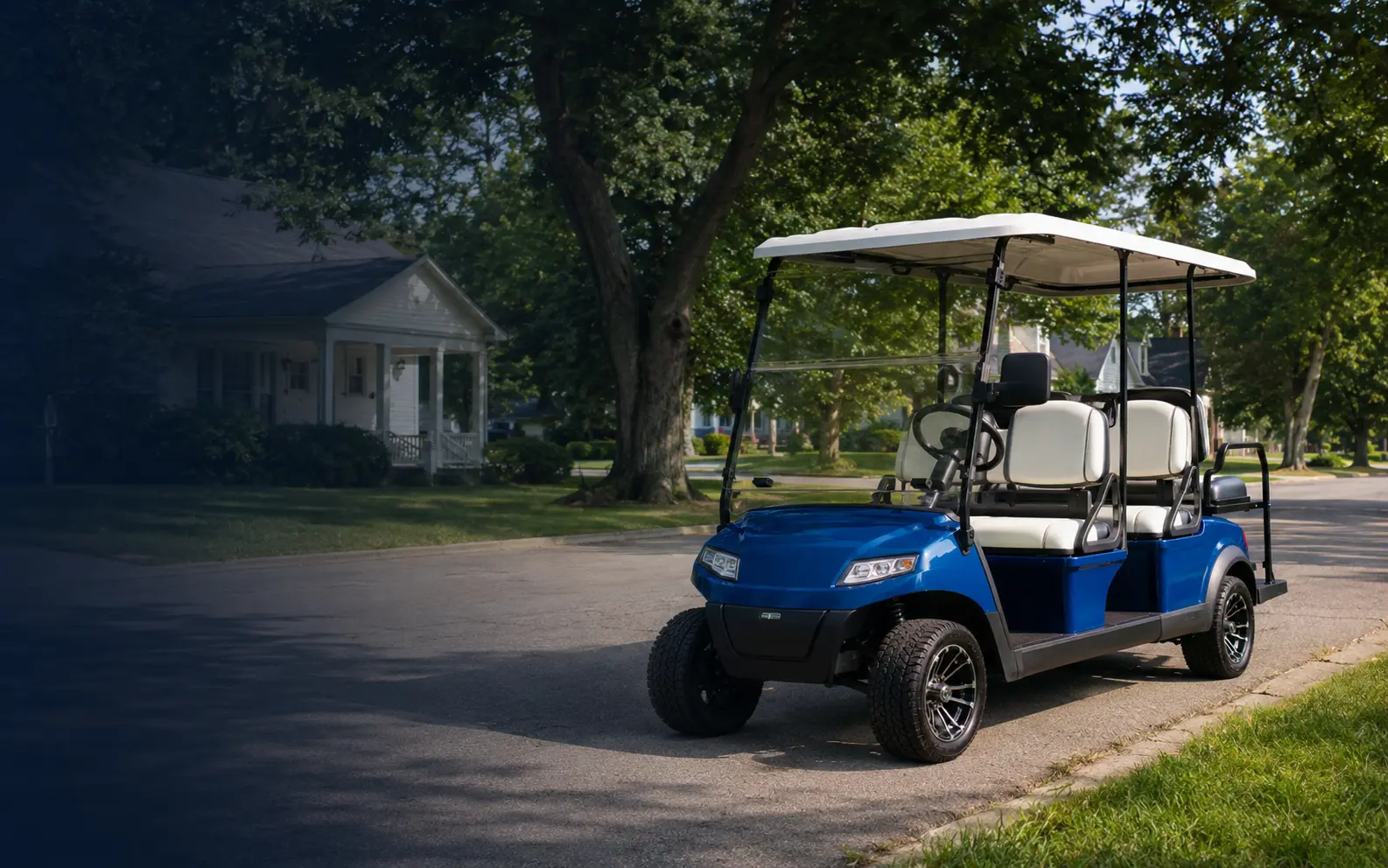 Blue and white six-passenger golf cart on a small-town Indiana street