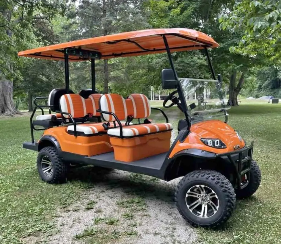 Orange custom golf cart with lift kit and accessories