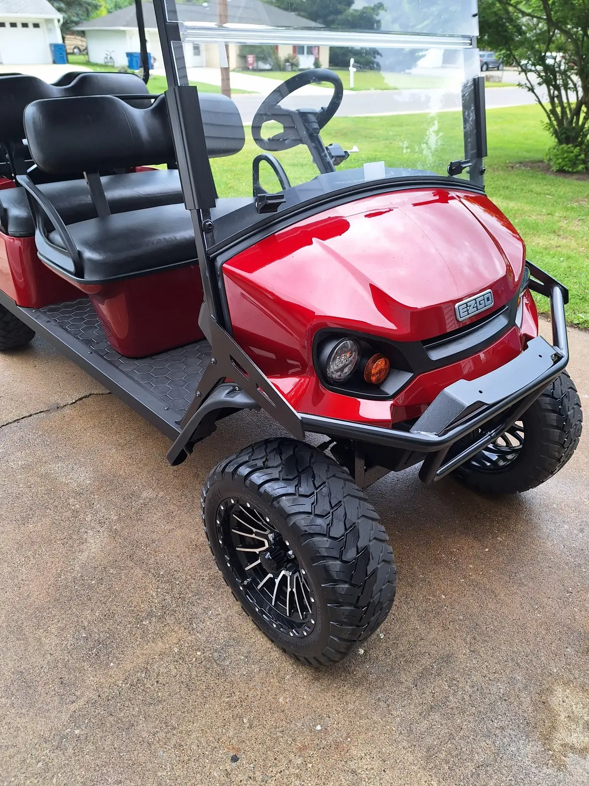 Bright red E-Z-GO golf cart in a Culver, Indiana driveway